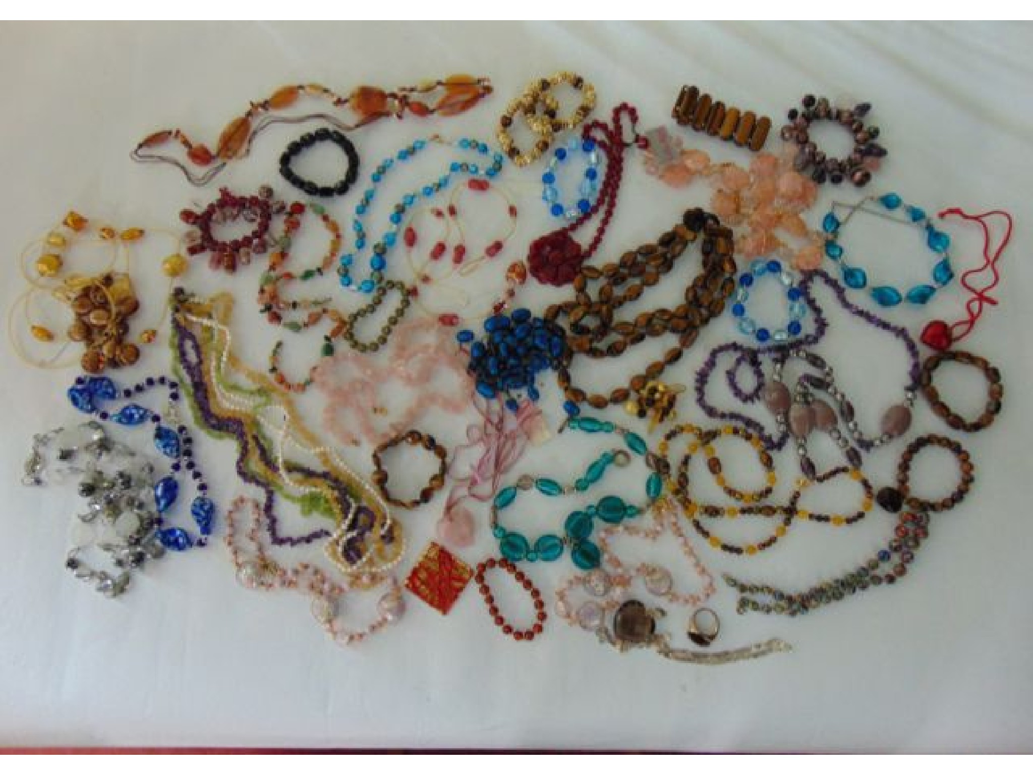 Appraisal: A miscellaneous collection of costume jewellery including glass bead necklaces