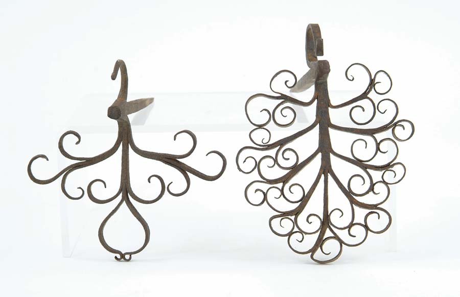 Appraisal: TWO FANCY WROUGHT IRON BEAM HOOKS Spiked ends with curved