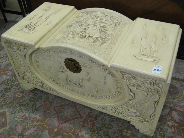 Appraisal: CHINESE CAMPHOR CHEST the highly carved lift top and sides