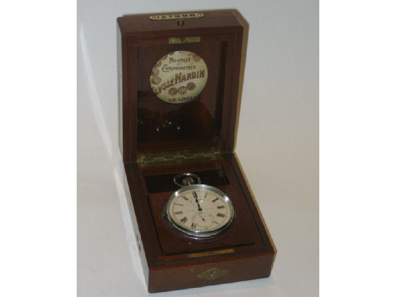 Appraisal: SWISS ULYSSE NARDIN CHRONOMETER IN CASE Original mahogany box with