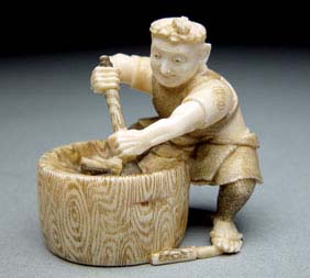 Appraisal: CARVED IVORY NETSUKE Well carved ivory netsuke of a worker