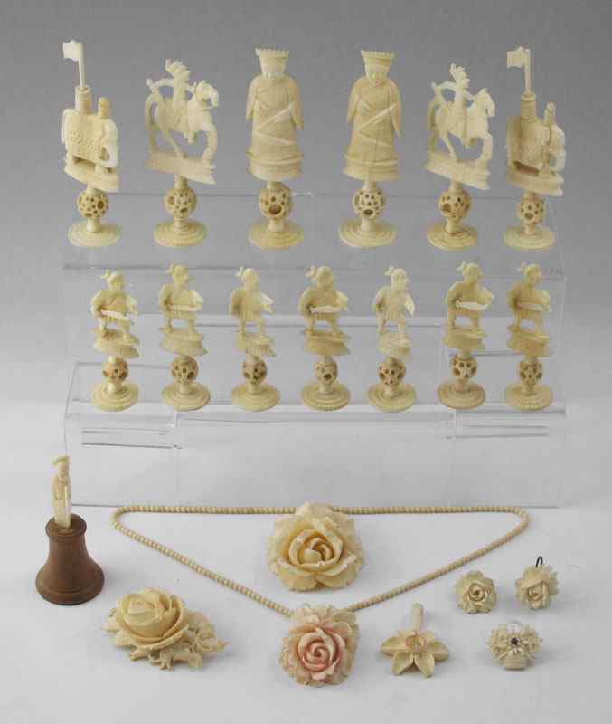 Appraisal: PIECE ESTATE CARVED IVORY COLLECTION An assembled collection comprising of