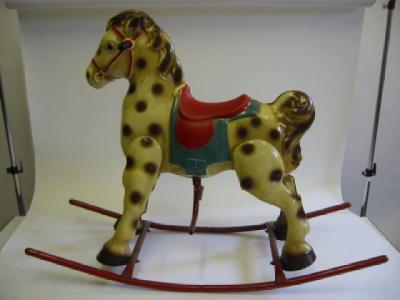 Appraisal: A Mobo rocking horse tinplate construction on tubular steel stand