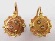 Appraisal: A pair of French hallmarked two colour carat gold seed