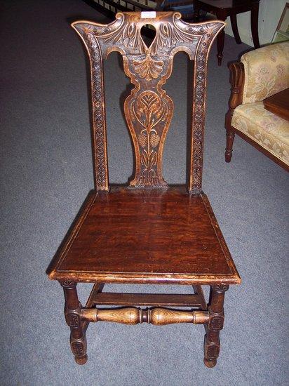 Appraisal: Six carved oak dining chairs with shaped cresting rails and