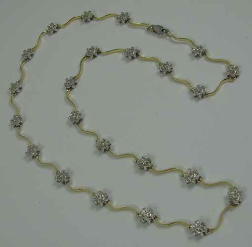 Appraisal: DIAMOND AND K YELLOW AND WHITE GOLD NECKLACE - in