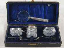 Appraisal: A boxed silver mounted cut glass condiment set of two