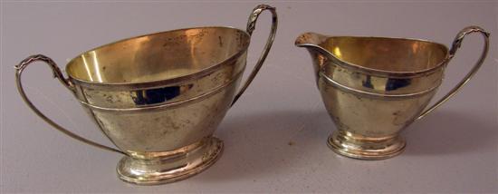 Appraisal: George V silver cream jug and matching sugar bowl each