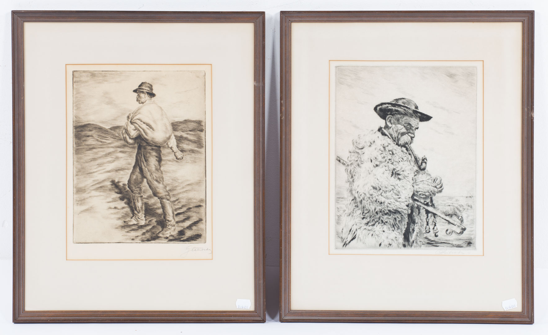 Appraisal: Two framed etchings of elderly men Undernumber