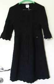 Appraisal: Chanel black cashmere short sleeved dress with draw string waist