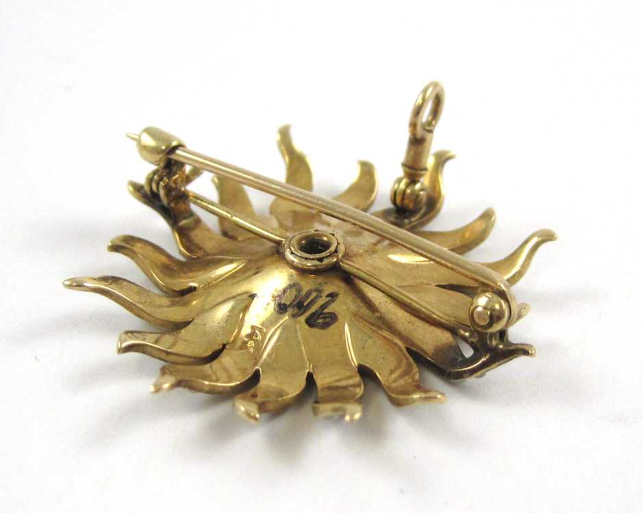 Appraisal: VICTORIAN DIAMOND STARBURST PENDANT BROOCH k yellow gold with seed