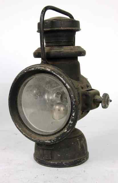 Appraisal: A Powell and Hanmer ebonised motor lamp cm high