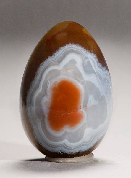 Appraisal: Carved Agate Egg Kazakhstan Distinguished by rich reddish-brown to one