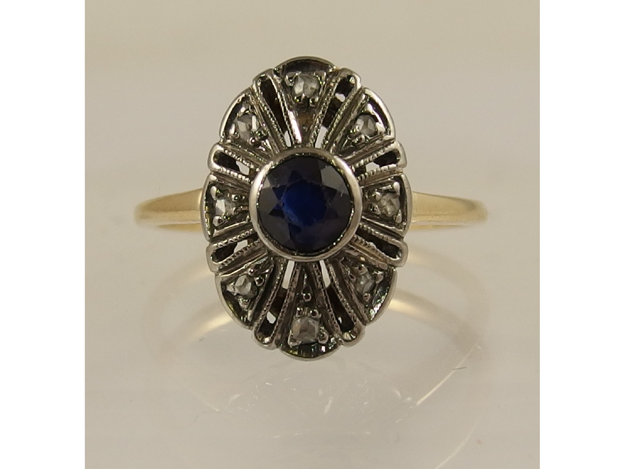 Appraisal: A ct gold rose cut diamond and blue gem stone