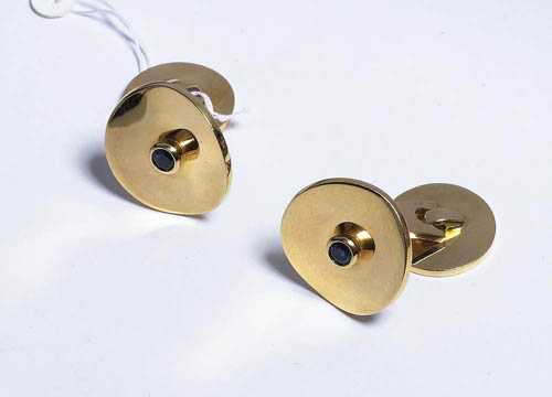 Appraisal: GOLD AND SAPPHIRE CUFF LINKS BURCH Yellow gold Elegant round