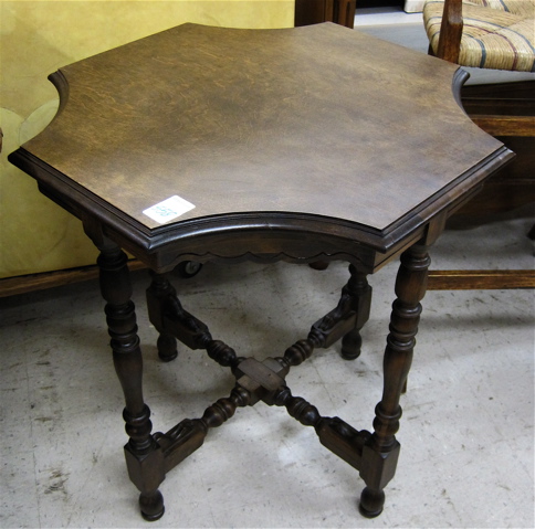 Appraisal: WALNUT LAMP TABLE American c 's having an octagonal top