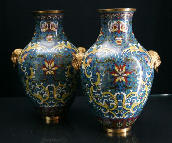 Appraisal: A pair of Chinese twin handled cloisonn vases of baluster