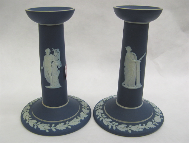 Appraisal: PAIR BLUE JASPERWARE COLUMN CANDLEHOLDERS white classical relief figures before