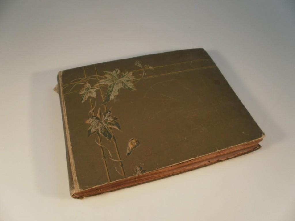 Appraisal: An Edwardian embossed postcard album inscribed to the frontispiece December