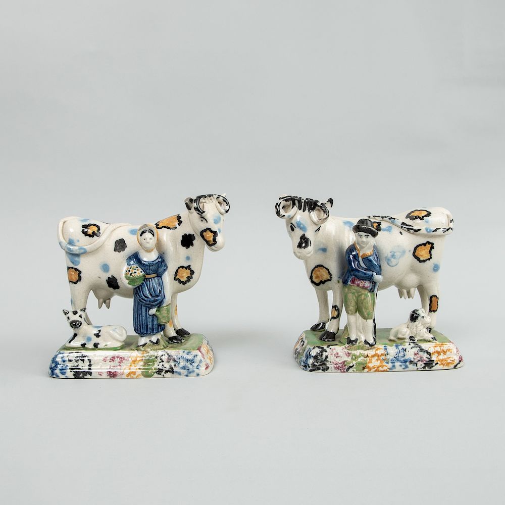 Appraisal: Pair of English Pearlware Pratt Type Milking Groups Each with