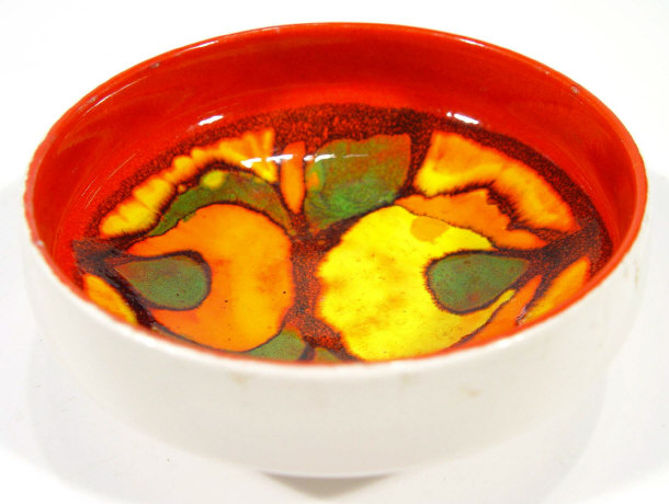 Appraisal: Poole pottery Delphis bowl with abstract red and orange decoration