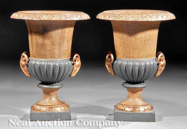 Appraisal: A Pair of Antique French Cast Iron Urns signed around