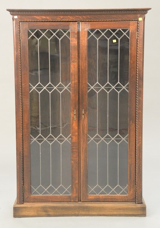 Appraisal: Oak Victorian bookcase with two leaded doors ht in wd