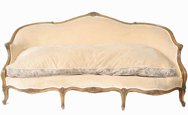 Appraisal: A Louis XV style carved walnut and upholstered settee height