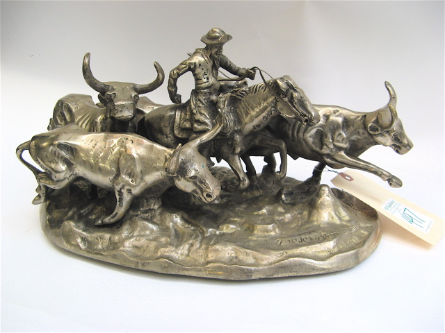 Appraisal: SILVERED BRONZE SCULPTURE AFTER FREDERIC REMINGTON American - depicting a