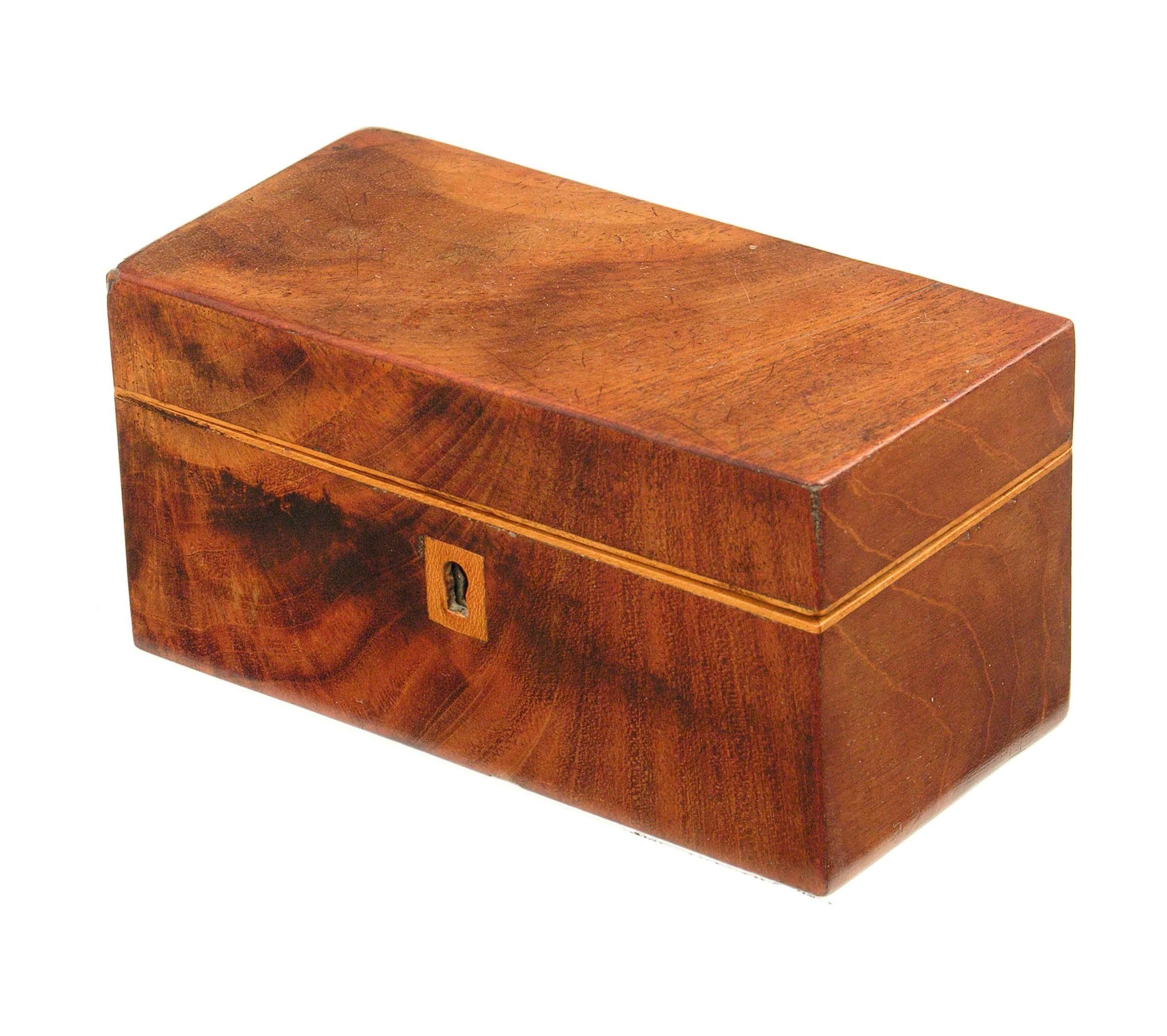 Appraisal: An early Victorian miniature mahogany tea caddy