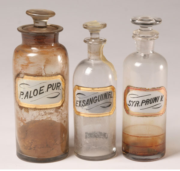 Appraisal: Eleven stoppered glass pharmacy apothecary bottles with glass labels minor