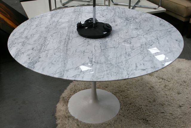 Appraisal: A marble topped circular breakfast table after Eero Saarinen cm