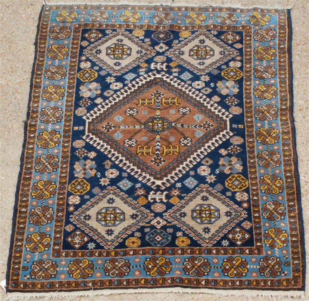 Appraisal: PERSIAN ORIENTAL GEOMETRIC DESIGN WOOL RUG center diamond medallion geometric