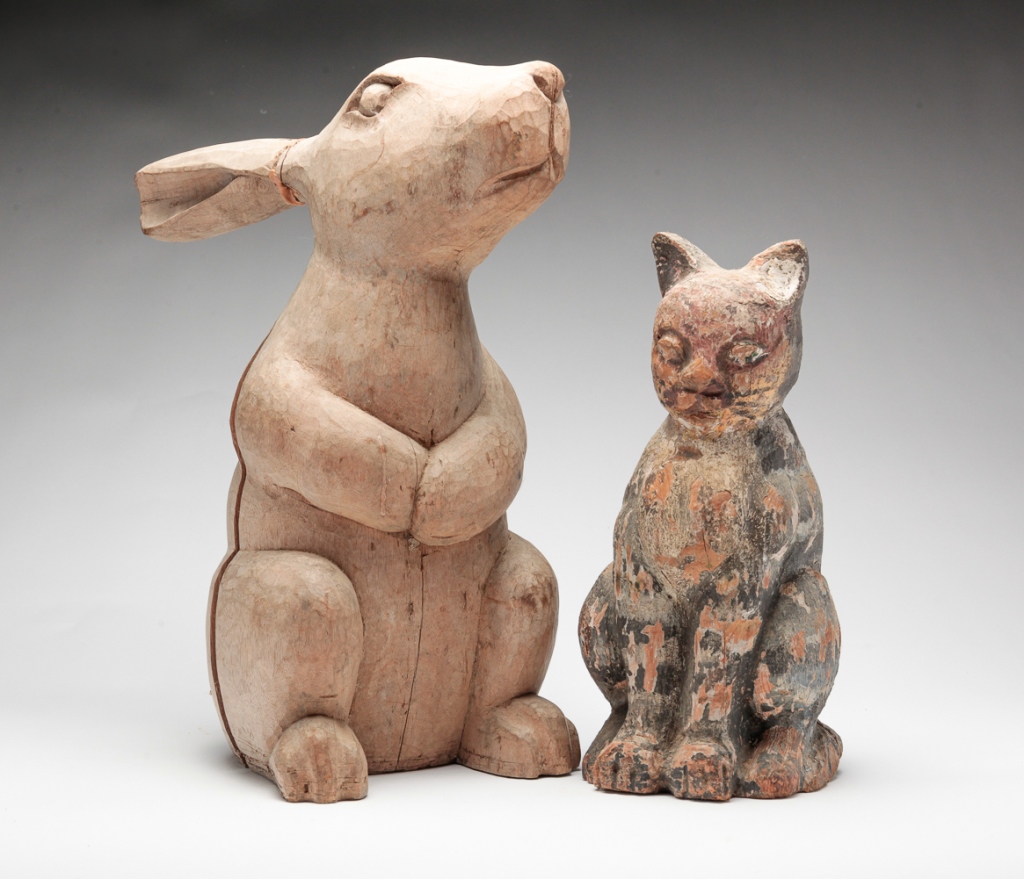 Appraisal: TWO WOODEN PAPIER MACHE MOLDS Twentieth century Rabbit Age splits