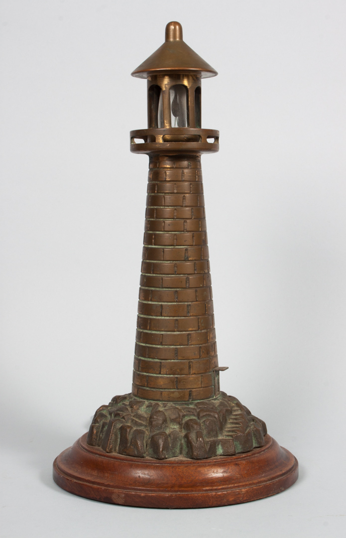 Appraisal: Bronze lighthouse-form lamp circa 's modeled as lighthouse on rocky