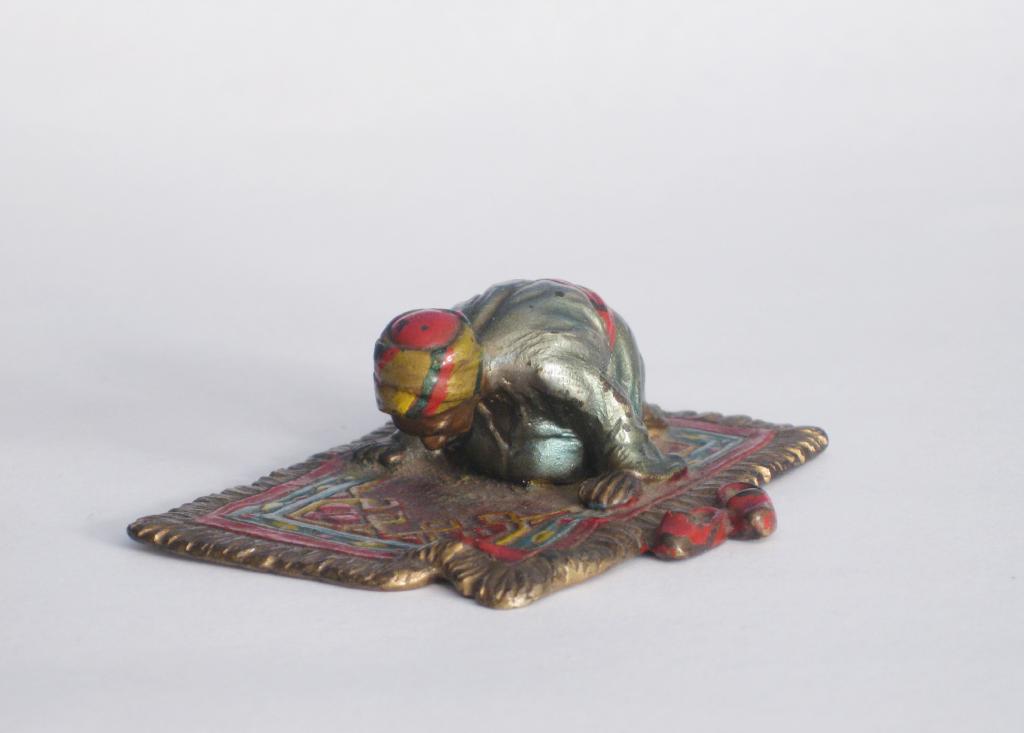 Appraisal: An Austrian cold painted bronze Figure of an Arab praying