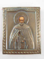 Appraisal: A Russian Icon of a Saint hand raised in blessing