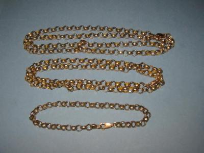 Appraisal: TWO GOLD NECKLACES and a bracelet in faceted belcher link