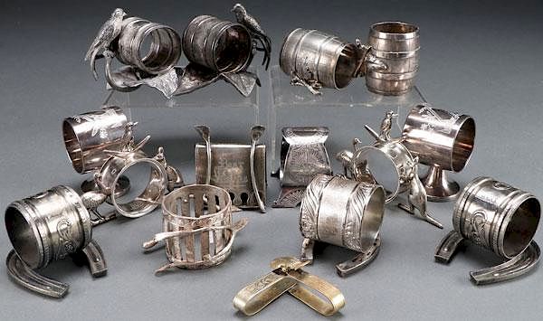 Appraisal: A GROUP OF SILVER PLATE NAPKIN RINGS A GROUP OF