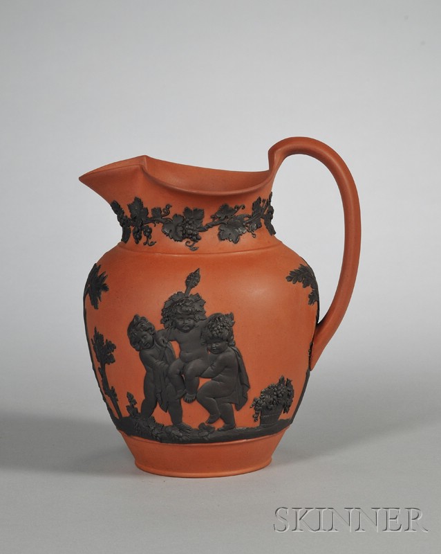 Appraisal: Wedgwood Rosso Antico Club Jug England c applied black relief