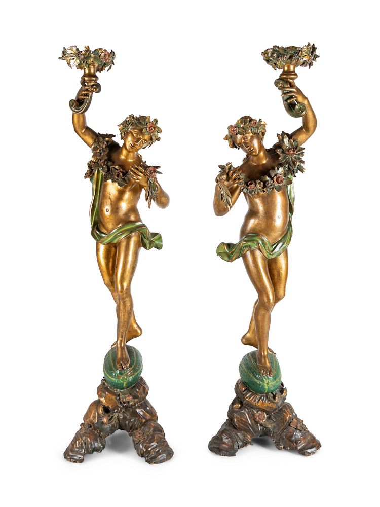 Appraisal: A Pair of Continental Gilt and Polychromed Figural Torcheres A