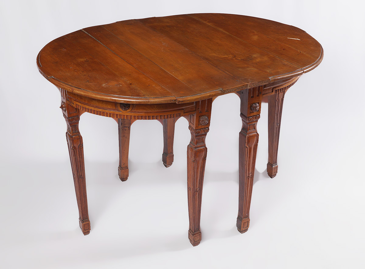 Appraisal: PAIR OF VICTORIAN CARVED DEMI LUNE TABLES Can be used