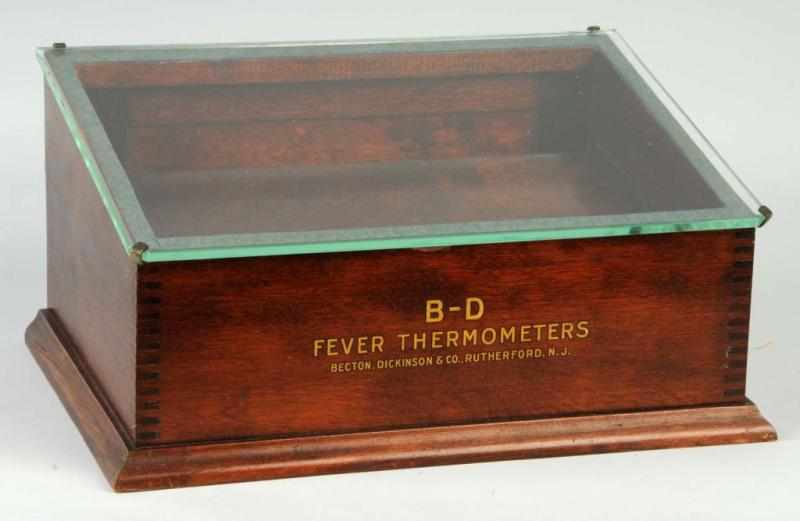 Appraisal: Glass Wood B-D Fever Thermometers Display Case Description With key