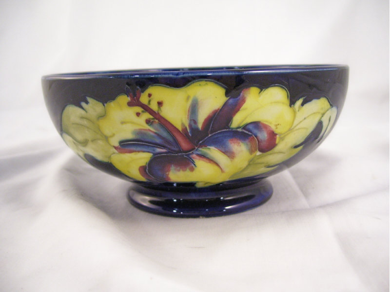 Appraisal: Moorcroft Hibiscus Bowl Footed bowl with a hibiscus floral design