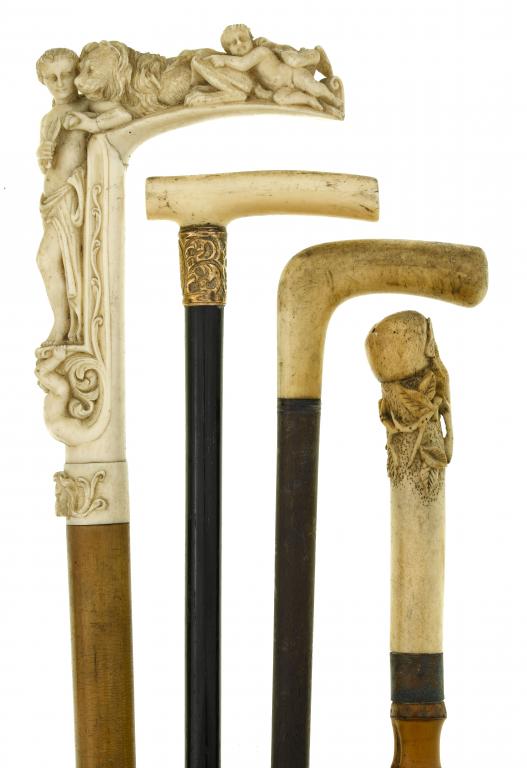 Appraisal: A VICTORIAN CARVED IVORY HANDLED CANE with the full length