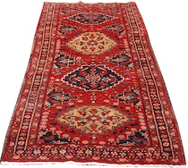 Appraisal: A Old Meshkin Runner Bright red centerfield woven with four