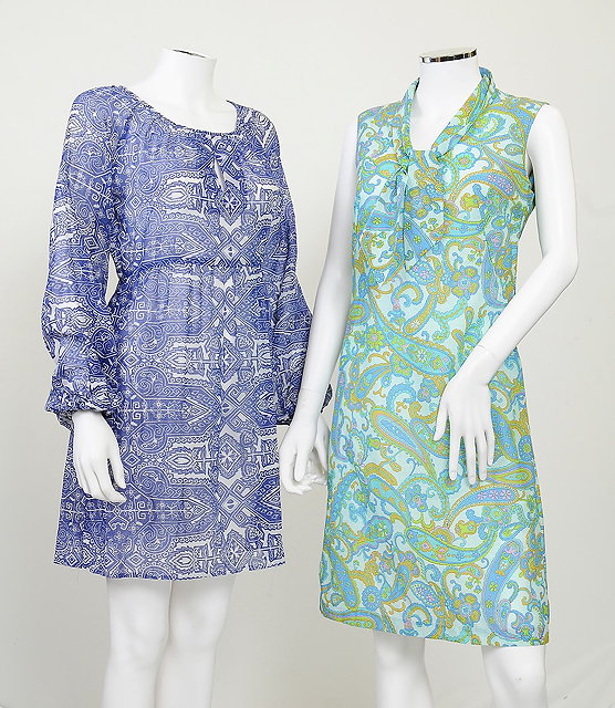 Appraisal: Two s dresses in blue tones one in paisley pattern