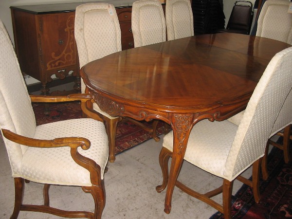 Appraisal: FRENCH STYLE NINE-PIECE DINING TABLE AND CHAIR SET WITH LEAVES