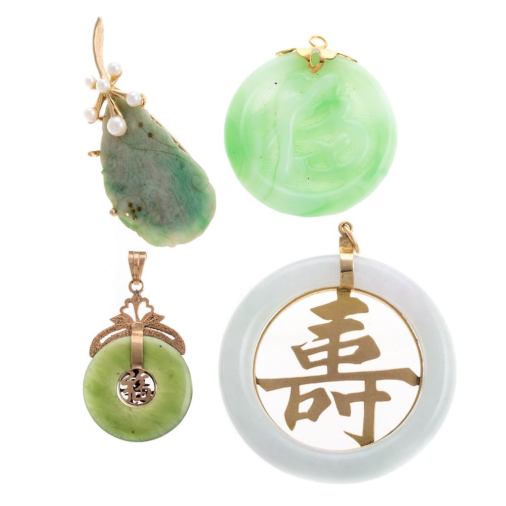 Appraisal: A Trio of Jade Pendants and a Jade Pin Engraved