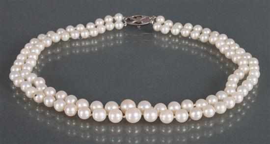 Appraisal: Double-strand pearl necklace decorated with an Art Deco white gold